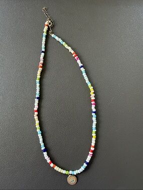 Multicolor Seed Bead Necklace with Gold evil eye charm